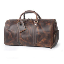 Load image into Gallery viewer, The Dagny Weekender | Large Leather Duffle Bag in brown full-grain leather with handles and multiple interior pockets, perfect for travel.
