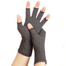 Load image into Gallery viewer, Hands wearing gray compression arthritis gloves for joint pain relief