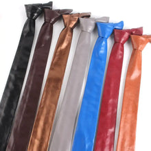 Load image into Gallery viewer, Assorted colors of polyurethane leather ties for men displayed in a row, showcasing vegan leather options for a modern wardrobe.