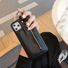 Load image into Gallery viewer, Luxury zipper PU leather wallet case providing stylish protection for iPhone, held by hand, showcasing its elegant design.