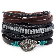 Load image into Gallery viewer, Multilayer leather bracelet with braided strands, metal beads, and leaf charm, offering rugged elegance and style.