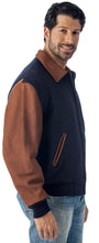Load image into Gallery viewer, REED Men's Executive Varsity Jacket with leather cowhide sleeves and wool body, union made in USA, worn by male model.