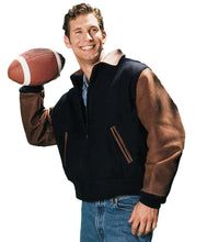 Load image into Gallery viewer, Man wearing REED executive varsity jacket with leather sleeves holding a football
