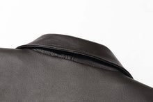 Load image into Gallery viewer, Close-up of REED Men's American Style Bomber Jacket in genuine leather, showcasing soft luxurious material and sleek design.