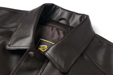 Load image into Gallery viewer, Close-up of REED Men's American Style Bomber Jacket in genuine leather showcasing luxurious craftsmanship and classic design.