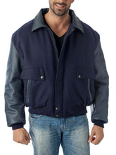 Load image into Gallery viewer, Man wearing REED leather varsity bomber jacket with wool body and leather sleeves, made in USA, classic and stylish design.