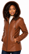 Load image into Gallery viewer, Woman wearing a brown leather jacket with fur hood on a white background