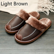 Load image into Gallery viewer, Men's light brown vegan leather slippers with fur lining for warmth, stylish design on wooden floor, cozy indoor footwear.