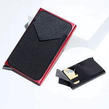 Load image into Gallery viewer, RFID black trifold leather slim mini wallet on a white surface showcasing sleek design and modern functionality.