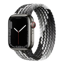 Load image into Gallery viewer, Black and white woven nylon strap on an Apple Watch, showcasing a braided design for Series SE/7/6/5/4/3. Compatible with various watch sizes.