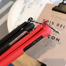 Load image into Gallery viewer, Close-up of luxury zipper PU leather wallet cases in black and red, designed for iPhone models, showcasing elegance and functionality.