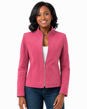 Cargar imagen en el visor de la galería, A woman modeling a pink zip-up jacket with a stand collar, worn over a white top and blue jeans, against a plain white background.