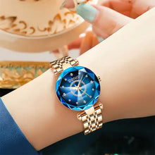 Cargar imagen en el visor de la galería, Elegant quartz watch with blue dial and stainless steel band, worn on woman's wrist, showcasing sophistication and durability.