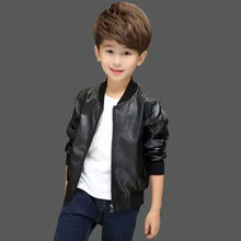 Cargar imagen en el visor de la galería, Boy wearing vegan leather and fur jacket, stylish winter fashion for kids