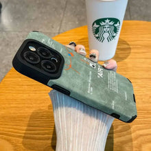 Load image into Gallery viewer, Person holding a green luxury leather sneaker phone case with Starbucks cup in background