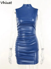 Load image into Gallery viewer, Women's sexy leather mini dress in blue vegan leather, sleeveless, designed for autumn and winter parties, bold and sophisticated style.