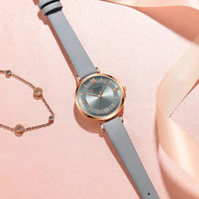 Load image into Gallery viewer, Classic Clock Leather Watch with quartz movement and water-resistant design, featuring a leather strap and elegant clockface for women.