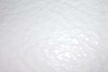 Load image into Gallery viewer, Close-up view of textured white surface with subtle pattern and glossy finish.