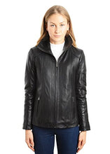 Load image into Gallery viewer, Woman wearing a REED EST. 1950 genuine lambskin leather jacket with stand-up collar and zip-up closure.