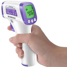 Load image into Gallery viewer, eZthings Heavy Duty Non-Contact Infrared Forehead Thermometer in use, LCD Display shown by a hand, white and purple design.