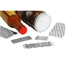 Load image into Gallery viewer, Tamper-evident shrink bands with 'Sealed for Your Protection' message on bottles, showcasing REED cutting shrink bands for caps.