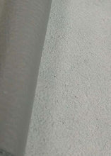 Load image into Gallery viewer, Close-up of a textured leather hide for crafting, showing the grain and surface quality of cow skin in neutral color.