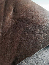 Load image into Gallery viewer, Close-up of a dark brown leather hide, chrome tanned, ideal for crafting soft leather garments and accessories, 8 x 11 inches.