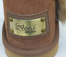 Cargar imagen en el visor de la galería, Close-up of REED Women's Suede Leather Boot with Real Fur Trim and branded metal plate.