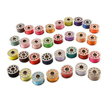Load image into Gallery viewer, Colorful sewing thread spools in eZthings Professional Sewing Kit for arts and crafts projects.