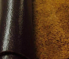 Load image into Gallery viewer, Close-up of leather hide showcasing glossy and textured surfaces, ideal for crafting soft leather garments and accessories.