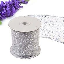 Load image into Gallery viewer, Sparkly sheer decorative ribbon roll in silver with purple flowers, ideal for party decor, gift baskets, and craft projects.