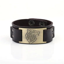 Load image into Gallery viewer, Vintage wide leather bracelet with intricate wolf head design, symbolizing strength and independence. Unique accessory for timeless style.
