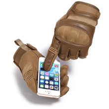 Load image into Gallery viewer, Touchscreen-compatible leather motorcycle gloves in brown, allowing smartphone use while providing comfort and durability on the road.
