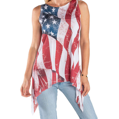 Women's American flag sharkbite tank tunic, sleeveless and made in USA, worn with jeans. Perfect for summer and patriotic events.