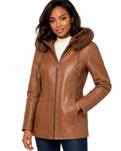 Load image into Gallery viewer, Woman wearing a brown leather jacket with fur hood on a white background
