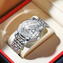 Cargar imagen en el visor de la galería, Luxury men&#39;s watch in elegant silver with a classic design, displayed in an open red box, symbolizing success and sophistication.
