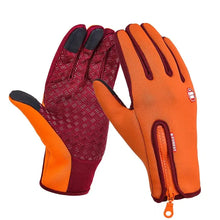 Load image into Gallery viewer, Orange touchscreen compatible unisex gloves with zipper design, ideal for using smartphones in winter weather.
