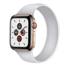 Load image into Gallery viewer, Gold Apple Watch 5 with white band, featuring a stylish and comfortable design for everyday wear.

