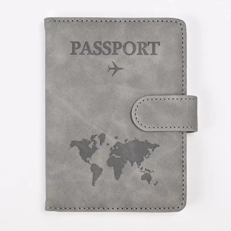 Gray PU leather passport holder with a world map design, ideal for stylish and organized travel.