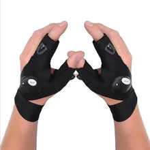 Load image into Gallery viewer, Two hands wearing black LED flashlight fishing gloves, ideal for outdoor activities like fishing, camping, and biking.
