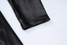 Cargar imagen en el visor de la galería, Close-up of Be So Faux Real Faux Leather Ruched Mini Dress sleeve featuring sleek black faux leather.
