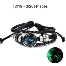 Load image into Gallery viewer, Pisces Zodiac leather bracelet with glowing astrological design. Stylish and symbolic accessory for elevating personal fashion.
