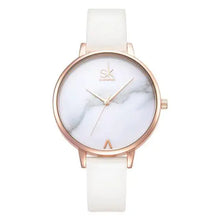 Load image into Gallery viewer, Elegant women&#39;s fashion watch with a rose gold bezel and white leather strap, perfect for elevating any outfit.
