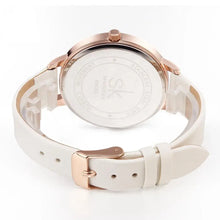 Load image into Gallery viewer, Luxury watch with rose gold case and white leather strap, showcasing elegance and timeless craftsmanship from the back view.
