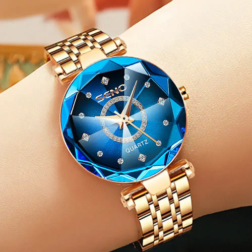 Elegant blue quartz watch with gold stainless steel band, perfect gift for women, featuring a scratch-resistant dial and water resistance.