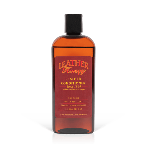 Leather Conditioner bottle for softening and restoring leather items, non-toxic formula for car seats, couches, and more.