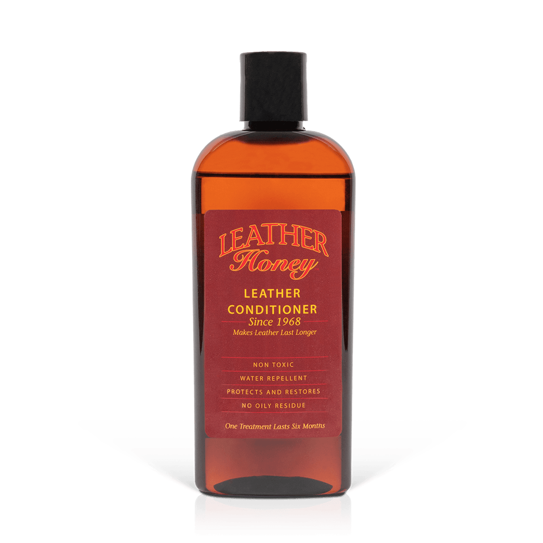 Leather Conditioner bottle for softening and restoring leather items, non-toxic formula for car seats, couches, and more.