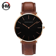 Load image into Gallery viewer, Rose gold dial leather watch with black minimalistic face and brown genuine leather strap, perfect for both casual and formal wear.
