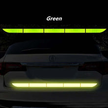 Load image into Gallery viewer, Car with green auto rear warning reflective tape for enhanced safety and visibility in low-light conditions.
