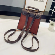 Load image into Gallery viewer, Vintage paneled PU leather women backpack on table, stylish vegan leather bag with straps, ideal for a fashion-forward explorer.
